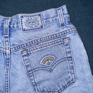 Thrifted raw hem Levi denim cut off shorts